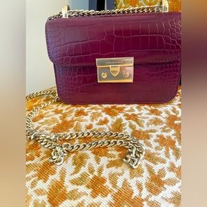 Burgundy push lock crossbody Charles & Keith